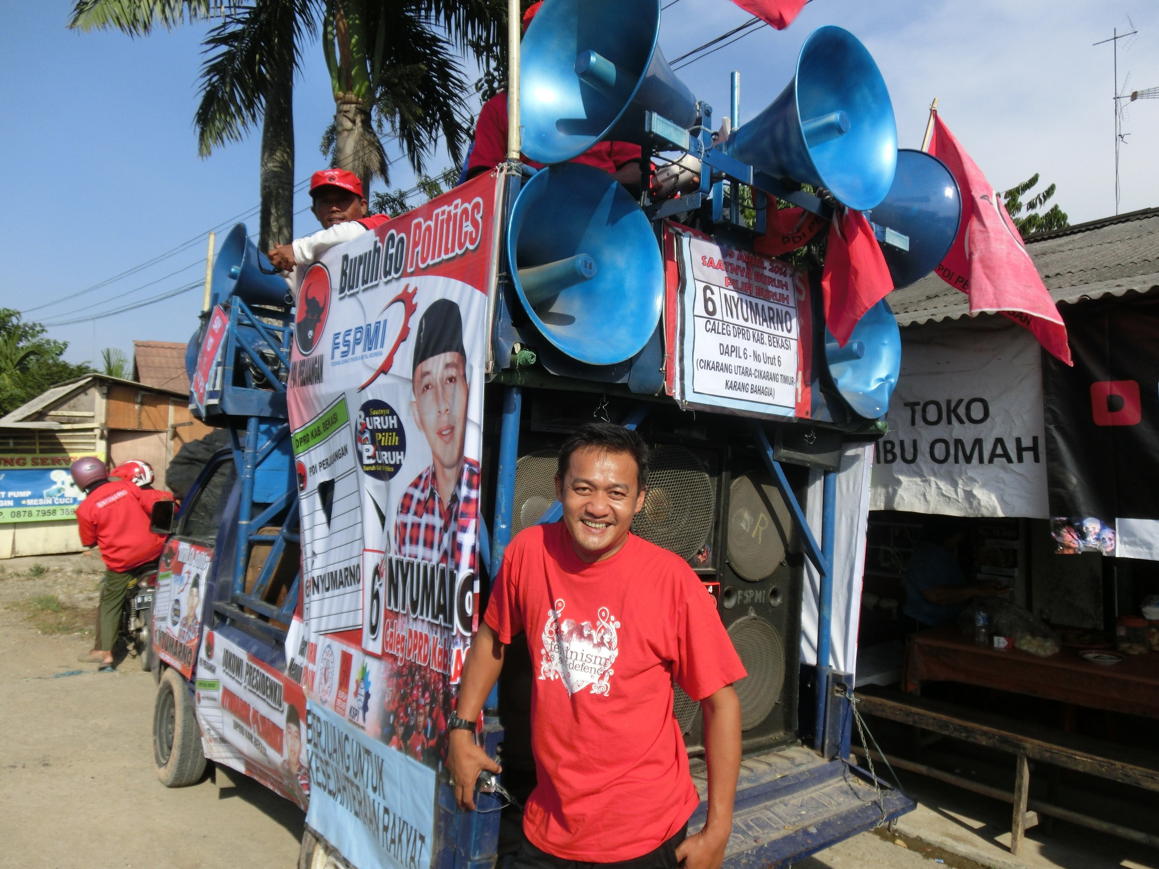 Obon Tabroni, head of the Bekasi branch of FSPMI and the force behind the ‘buruh go politik’ campaign in Bekasi. The truck is used by the union in demonstrations and strikes and is usually covered in FSPMI banners but was used by all the worker candidates with their different party colours during the campaign - Kirsty Hoban Workers – go politics!