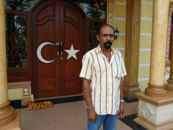 Former GAM commander Darwis Djeunib outside his new home / Edward Aspinall